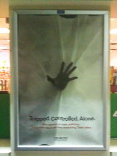 Anti-drug poster in the window of a gas station in Louisville, Kentucky.