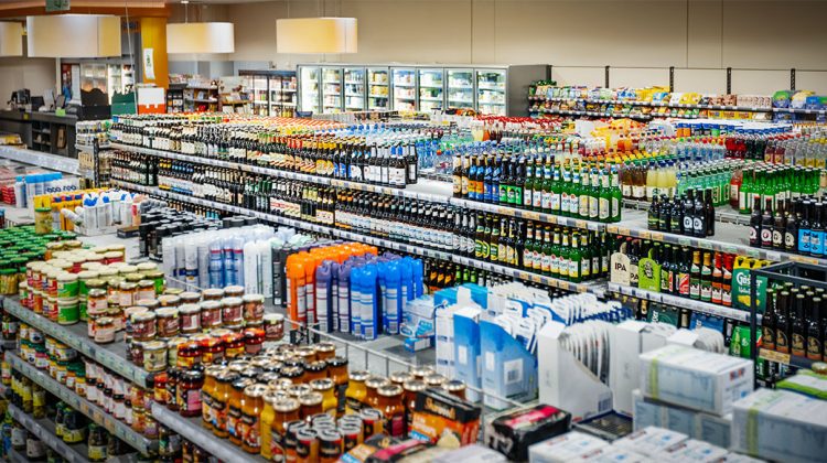 Overview of grocery store shelves showing thousands of items for sale. (Licensed iStock photo ID:1486055079)
